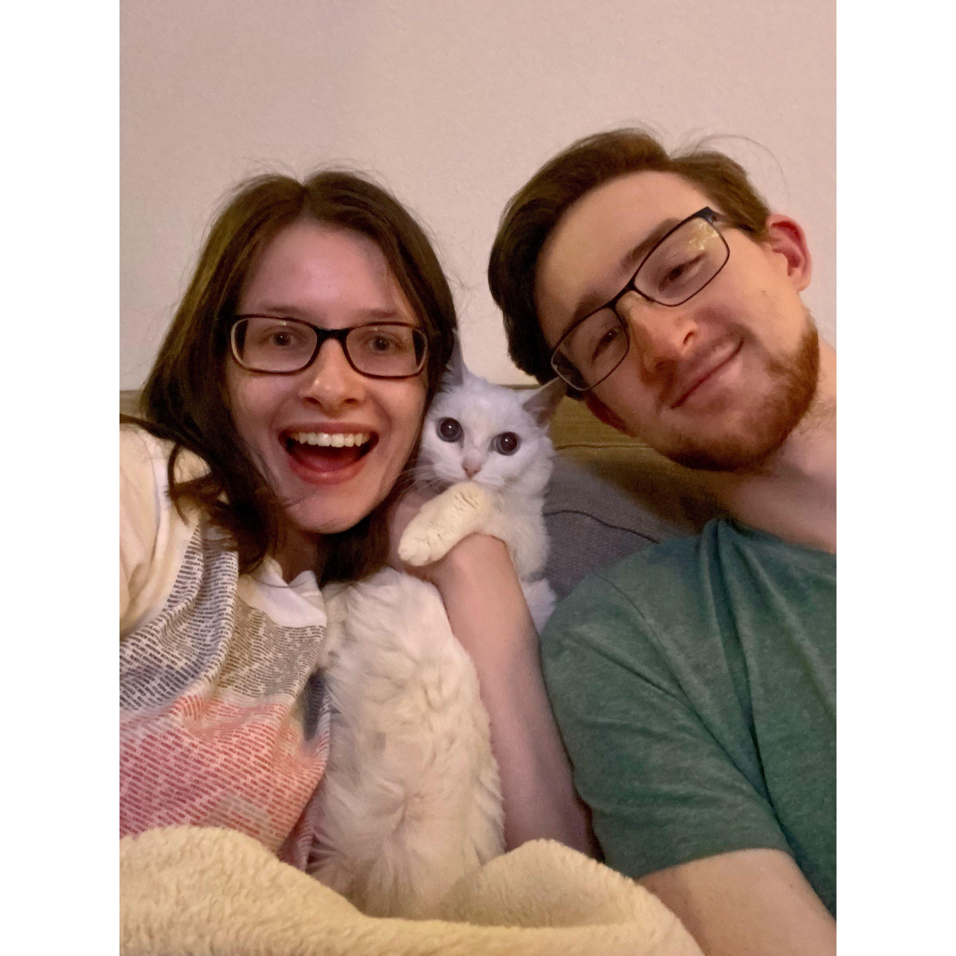 After we moved in together, Alex found a new friend in Emily's childhood cat, Eve. Somehow, this is the only "family photo" we have.