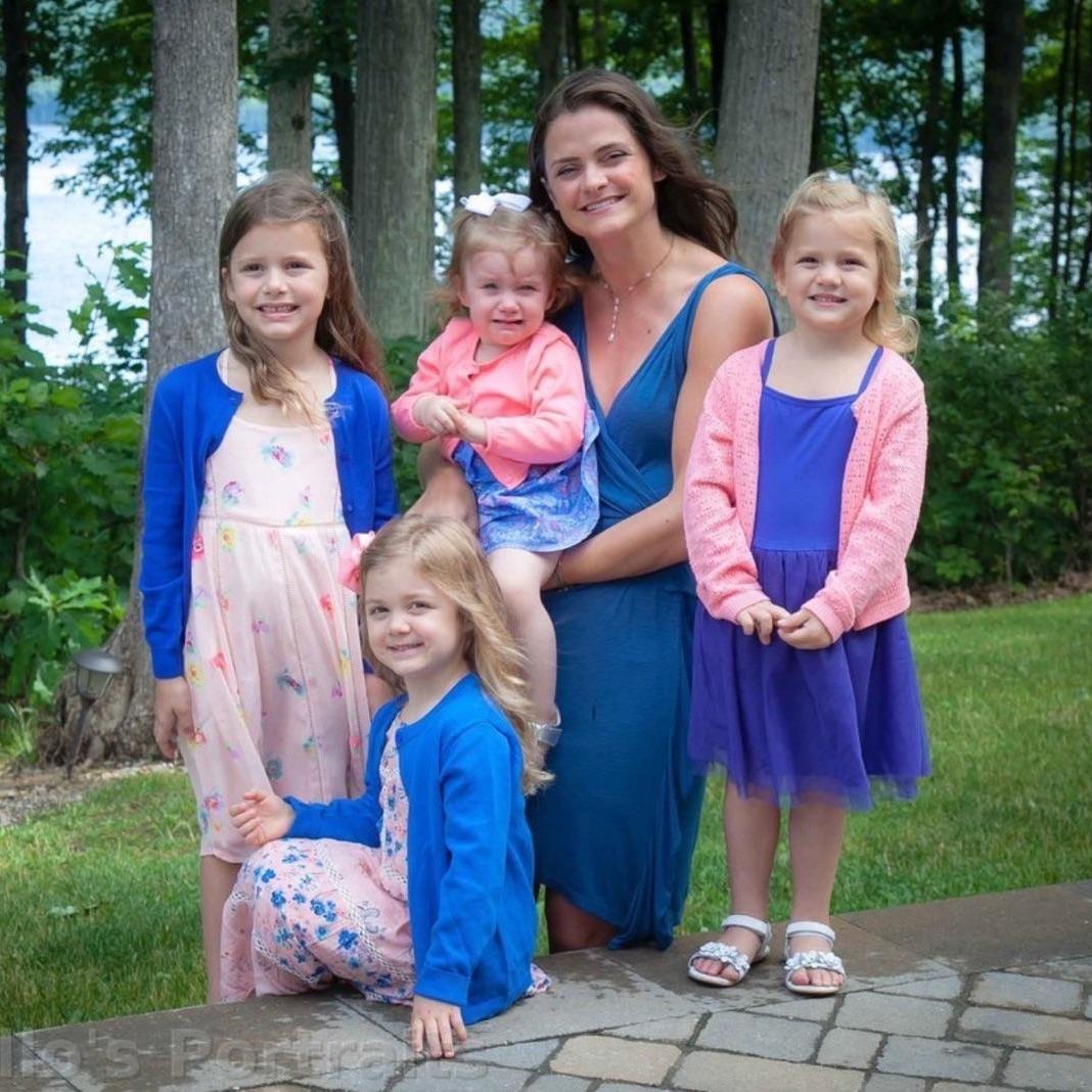 All four flower girls--Melissa's nieces! The little one, Charlotte, will hopefully be alot happier to throw rose petals than she was to take this picture.