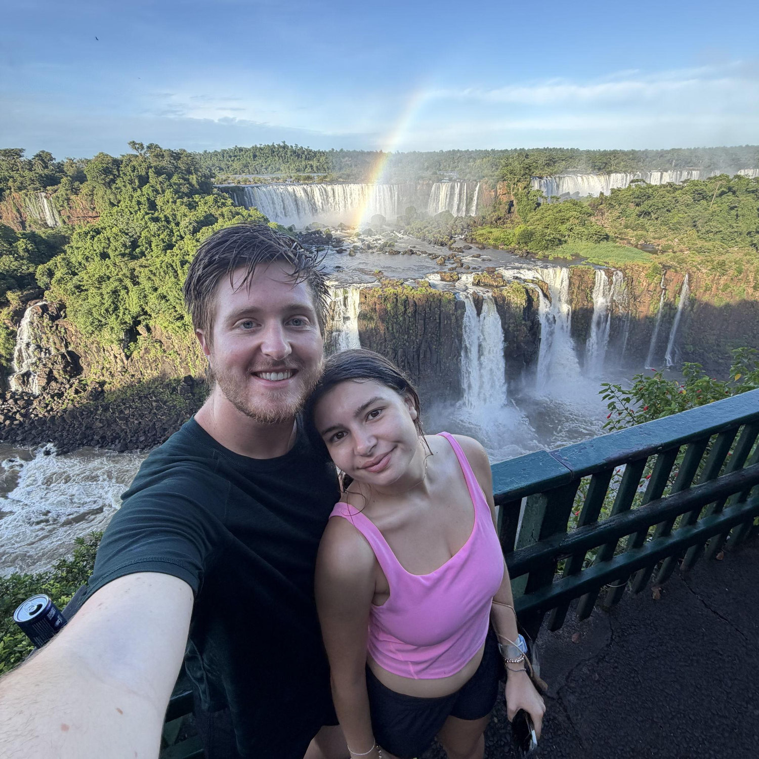 Chasing waterfalls and rainbows at Iguazu Falls, Brazil. Travel partners for life!