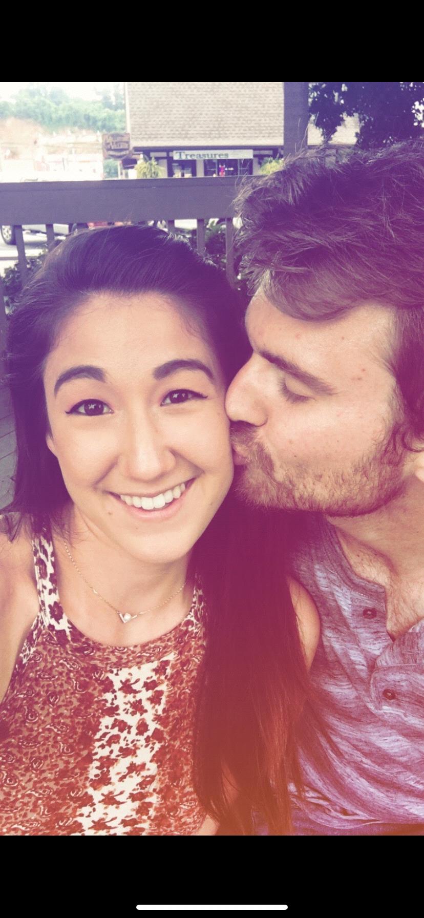 A quick peck before exploring a water mill in Pigeon Forge, TN.