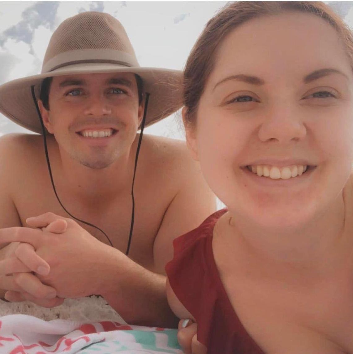 This was right after Evan had to dig a hole in the sand for my not so little baby bump.