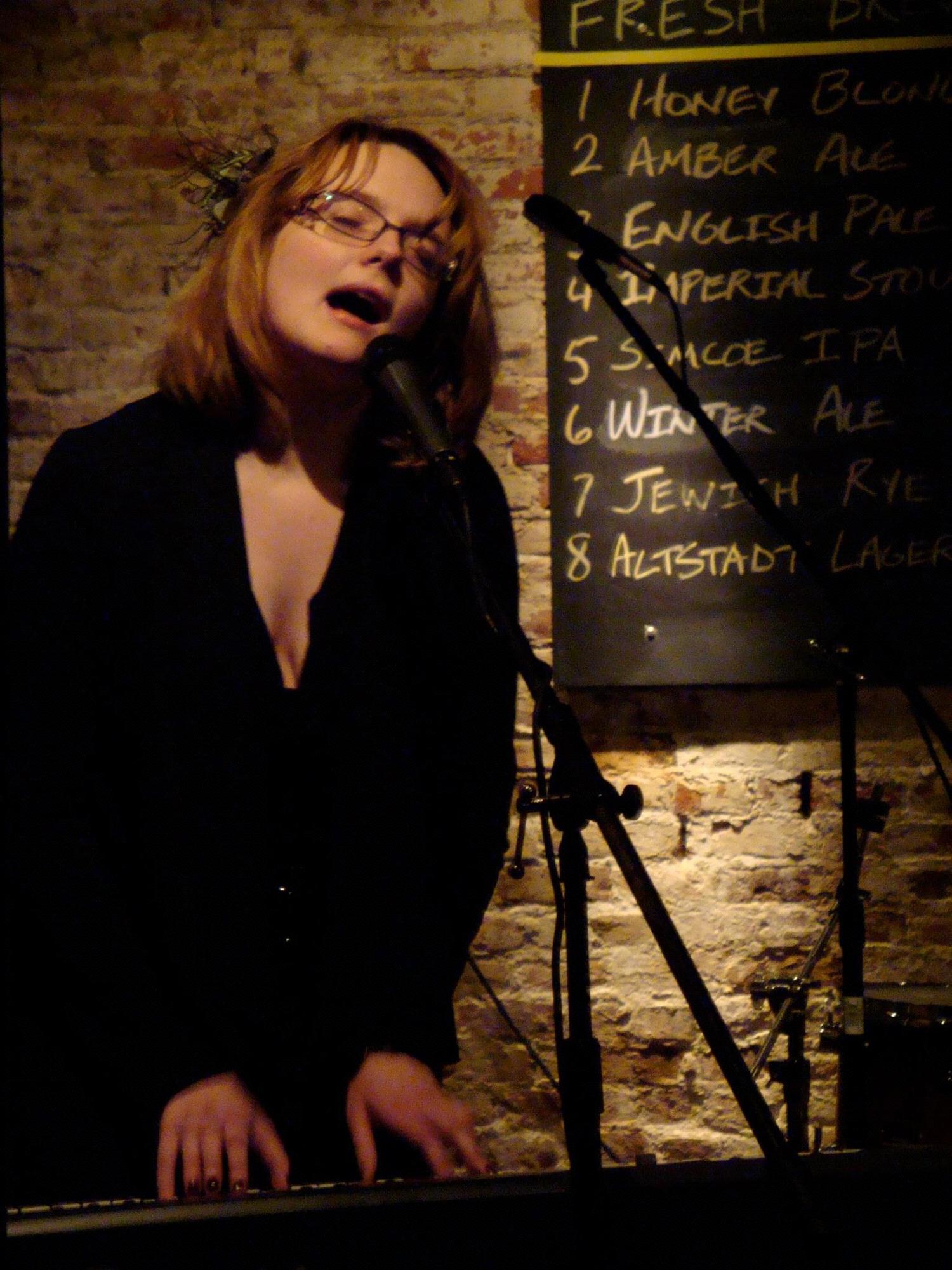 Julia performing at the Triumph Brewery in South Philly.