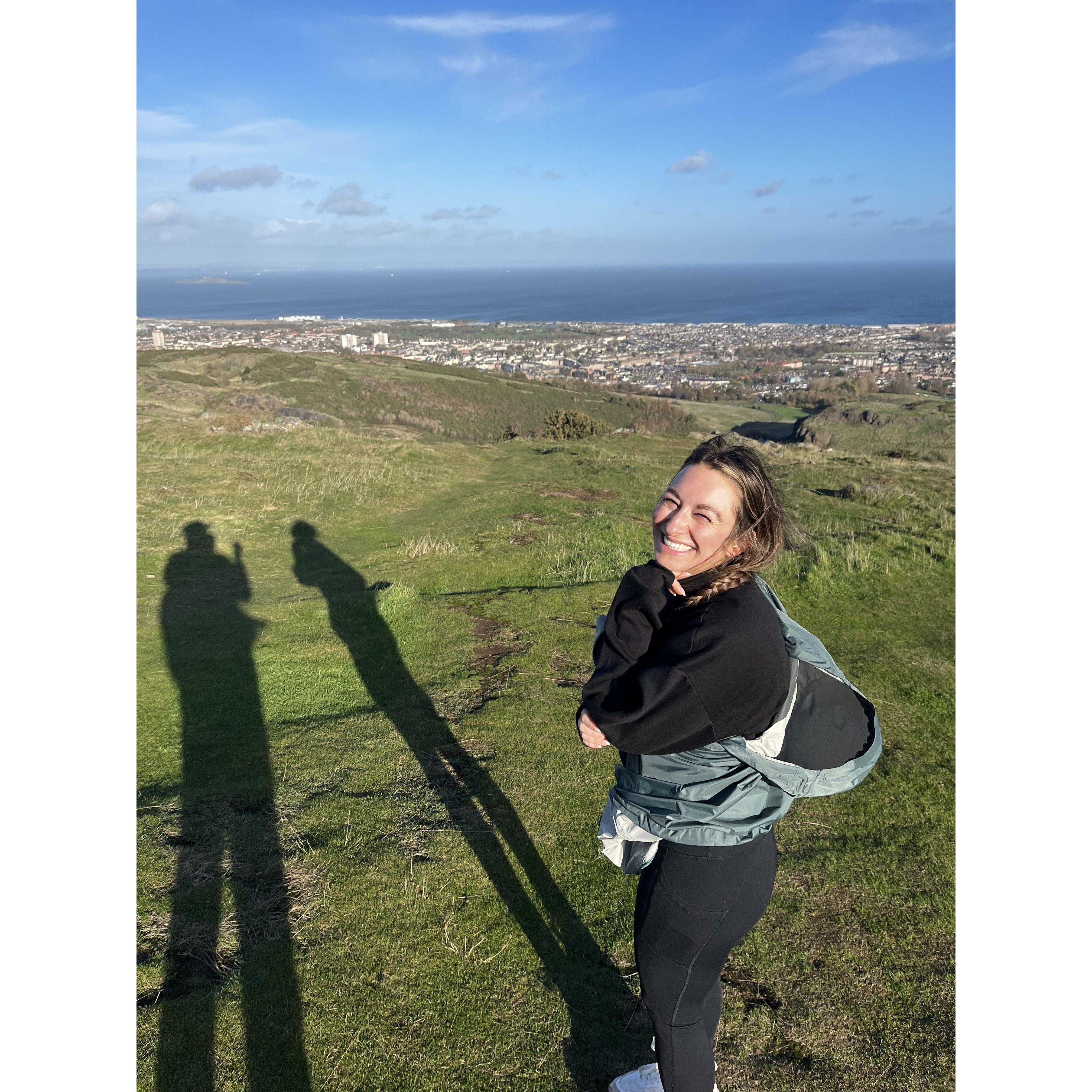 Kyle proposed to Carly on a hike in Edinburgh, Scotland