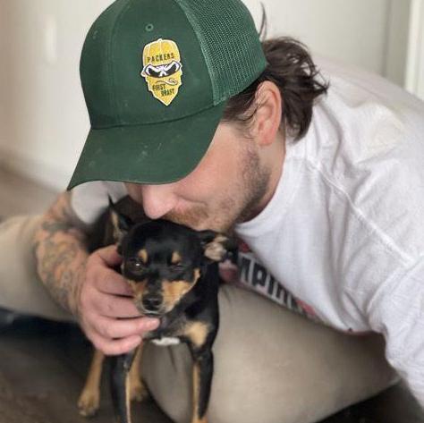 Samuel is a good dog dad.