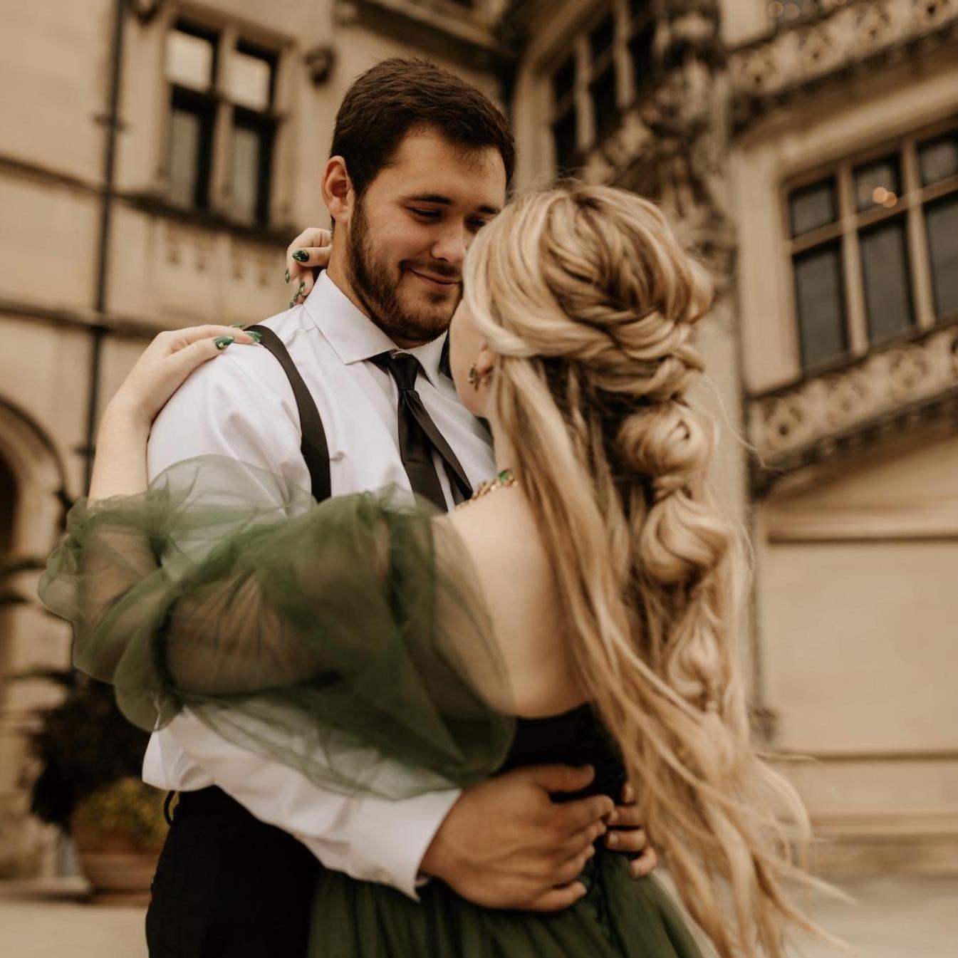 This was us just outside the main stairwell of the Biltmore, dancing in the rain. We had a lot of people stopping to take pictures! (August 30, 2021)