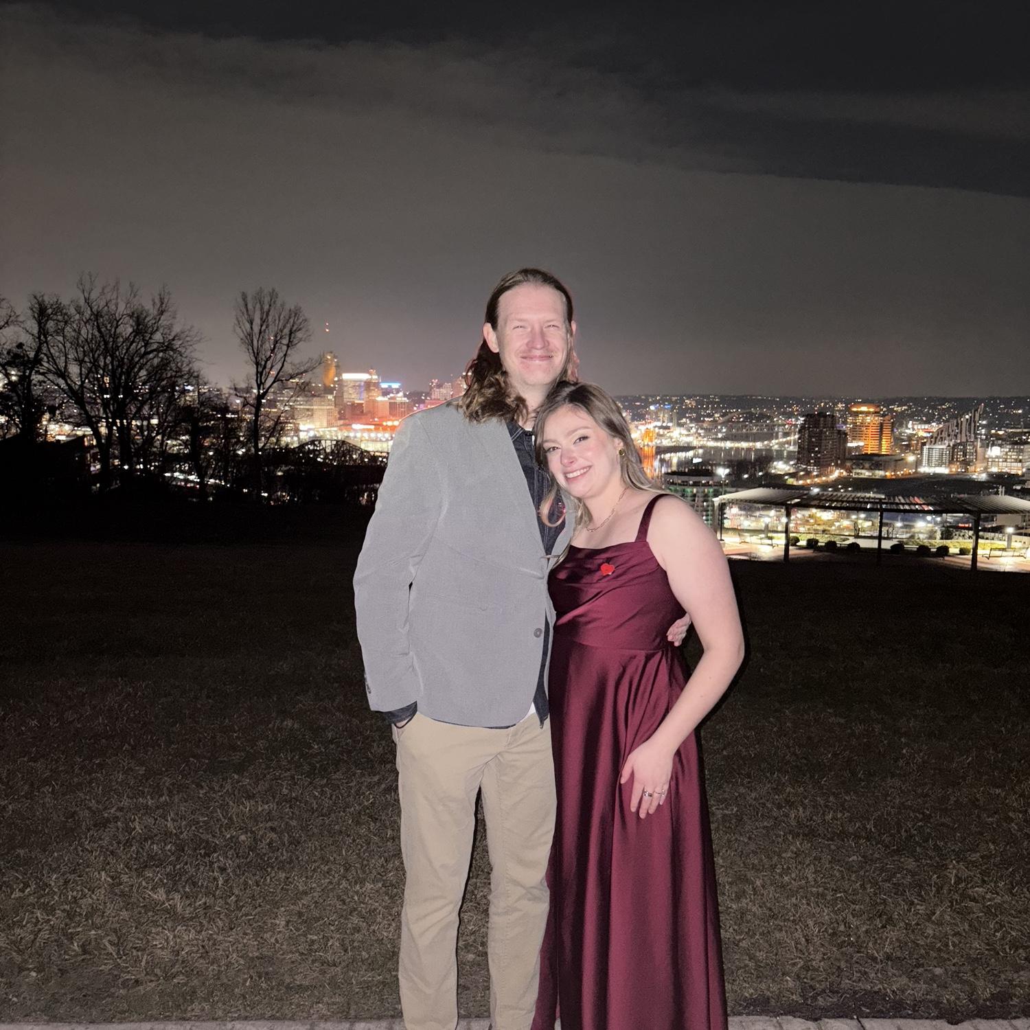 Us at our dear friend's Natalie and Sam's wedding this past January with the Cincinnati skyline in the background!