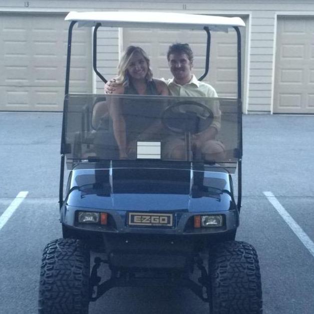 Our first "posed" picture! Jake surprised Shelby with a sunset golf-cart ride around Mud Island (thanks, Bradley Richlin!)