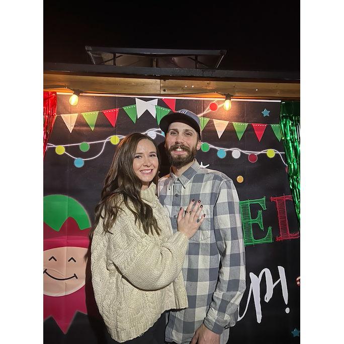 Taking cute pictures at a Christmas party. December 22nd, 2023