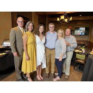 Graduation reception with the family! Sydney's heels did not fair well throughout the day.