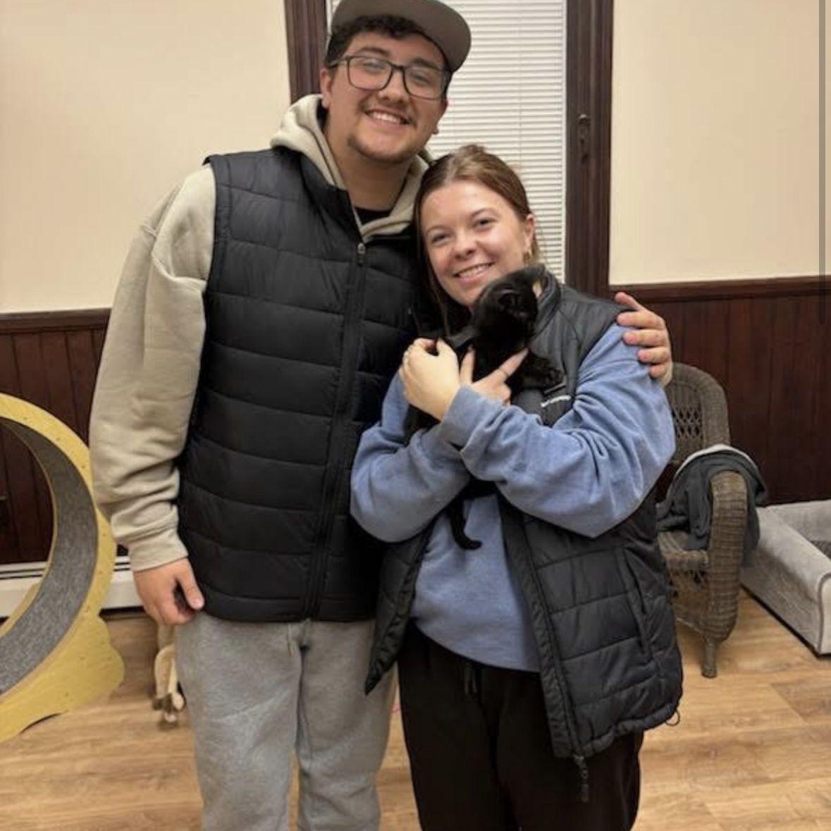 Us when we got our kitten, Bandit.