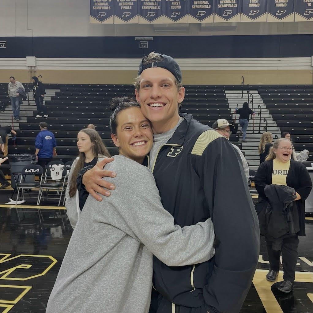 Carter supporting Madison at her senior night.