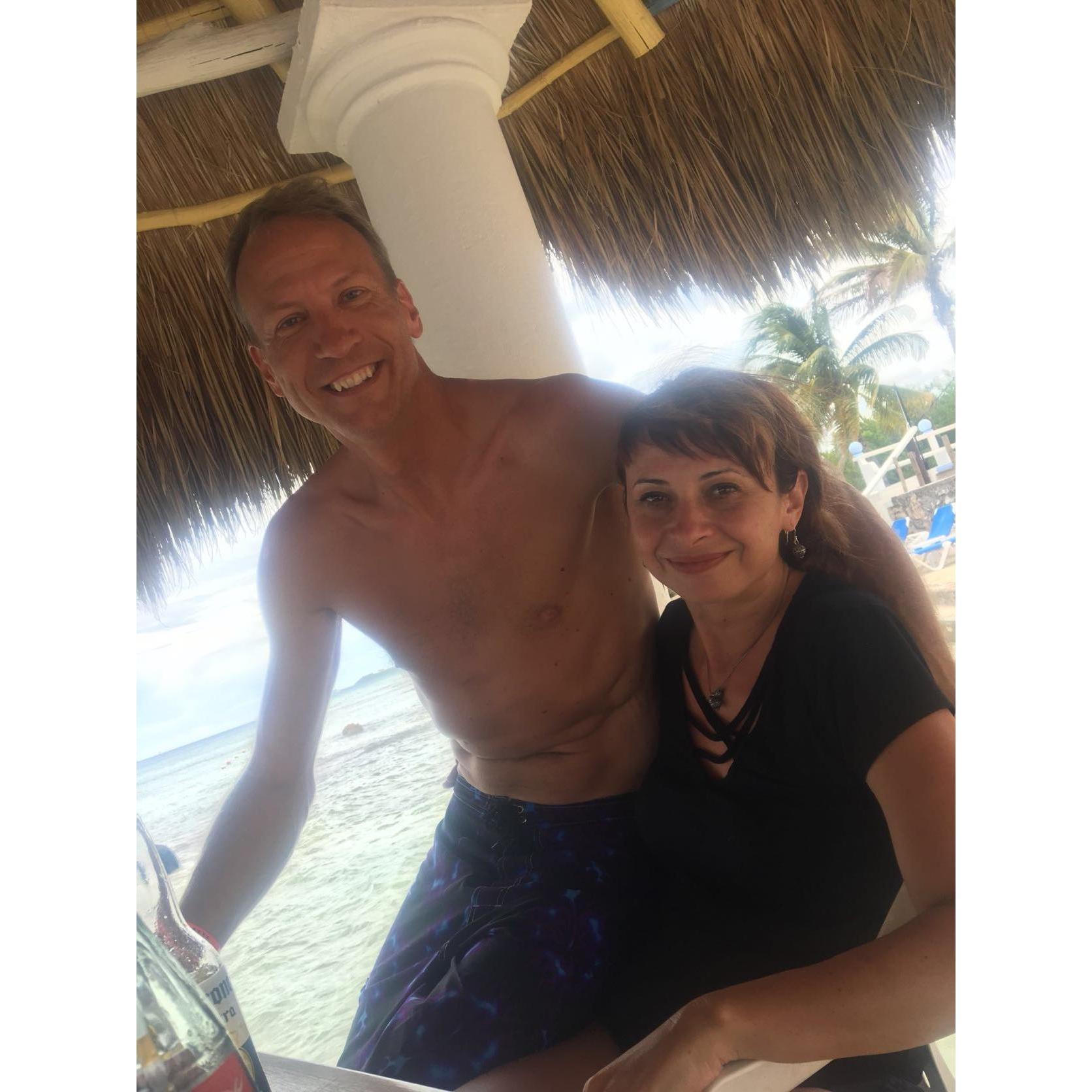 Before or after snorkeling, we don't remember and who cares, we are happy by the water at the Corona beach bar in Cozumel.