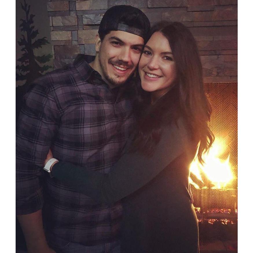 The fire behind us represents the flame of our ignited relationship. Because we met on Tinder...get it?