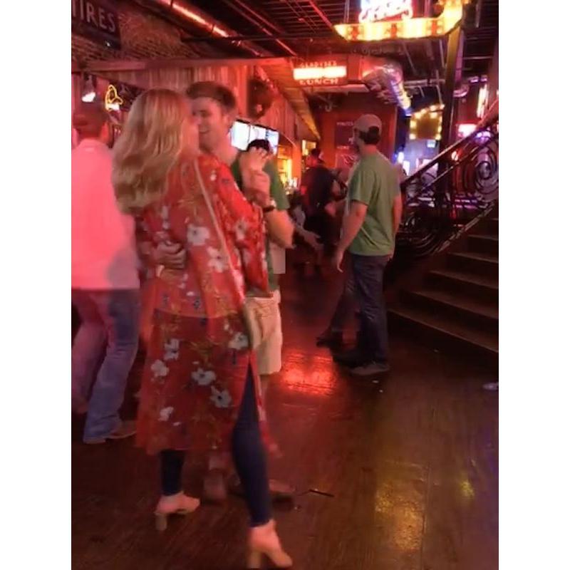 We went to Broadway after a wedding to meet Teran's friends. As we were leaving, Teran grabbed Brittany, started dancing, and Nathan snapped this. It was seconds before Brittany said "I love you".