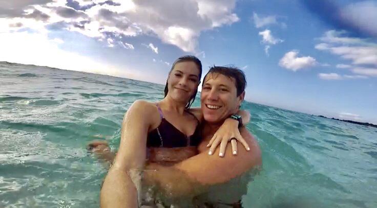 The first selfie of the couple way back in 2017 in Hawaii. Trevor made Kaleigh the wooden ring she's wearing in this photo and it is the same one he used to propose.