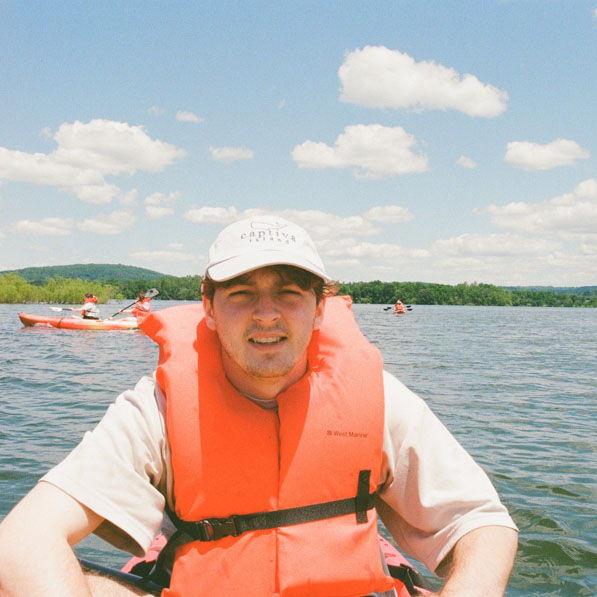 Jack on a kayak taken by Em (also on kayak)
