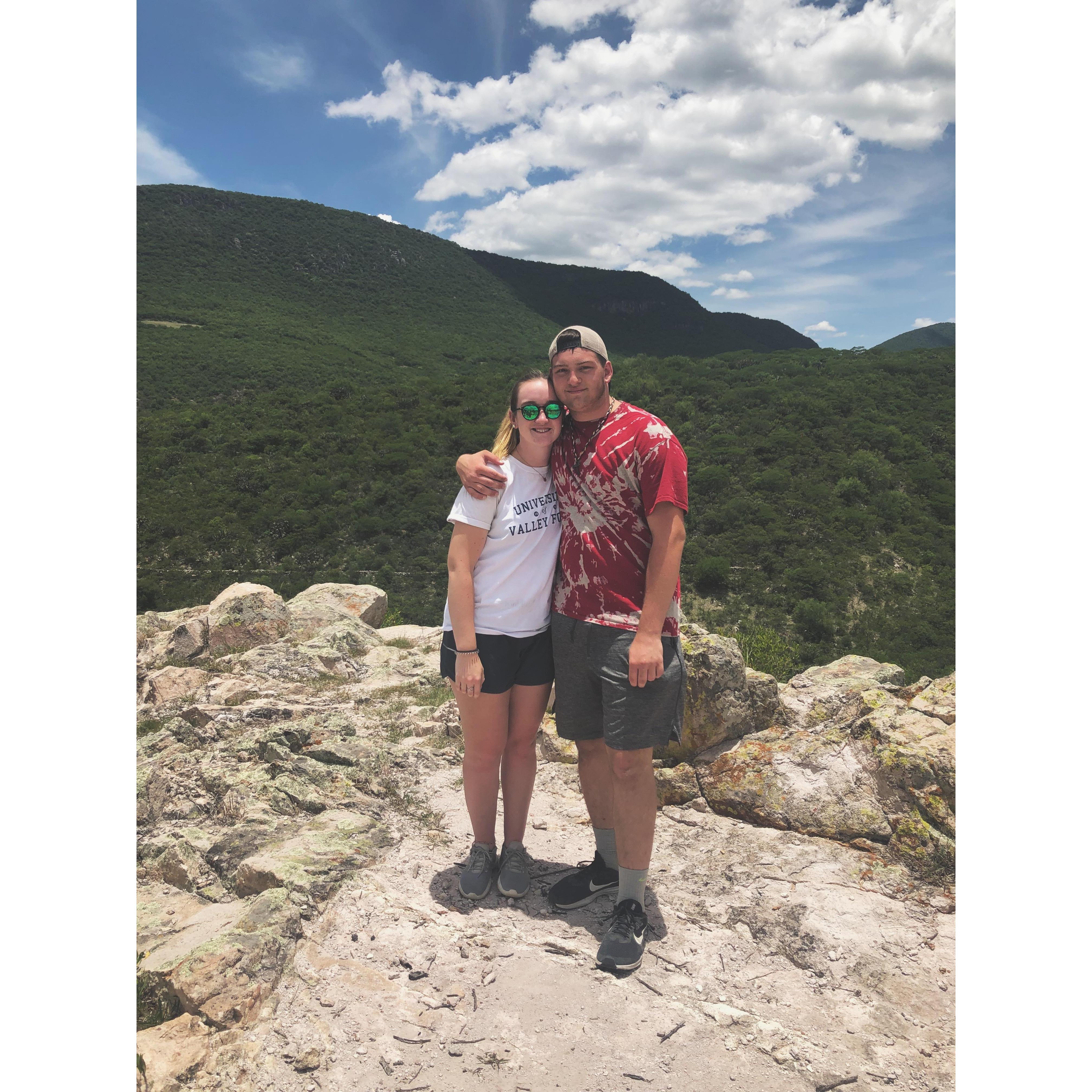 A hike up a mountain in Mexico, right before Isaiah slips and falls into a cactus and barbwire. 🌵