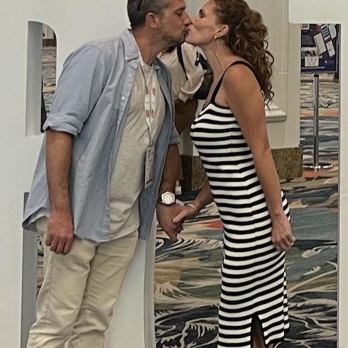 Smooching in front of the HRTech sign (Las Vegas...again)