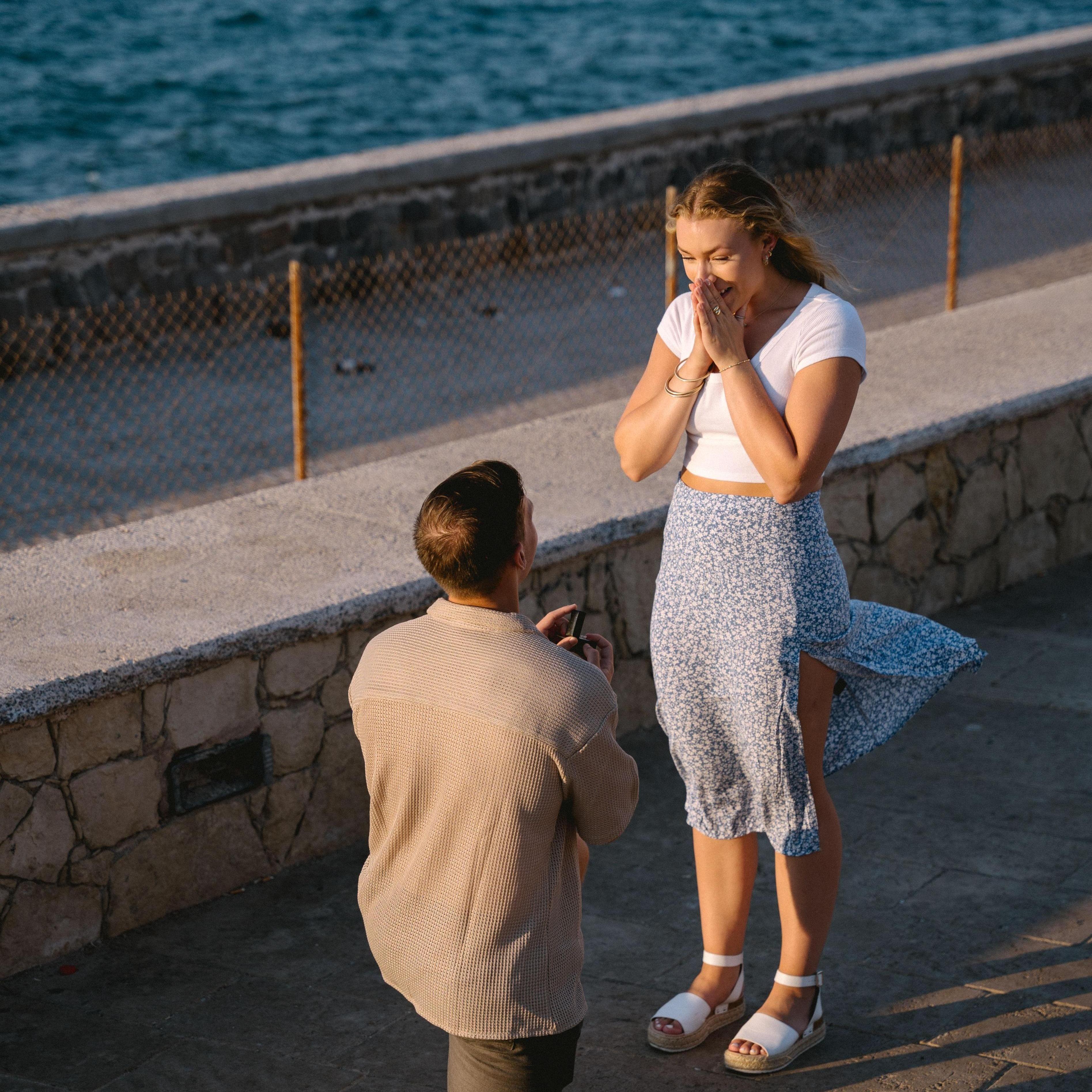 He proposed!!! Dill had a photographer waiting for us and had already picked out the most beautiful location. I had no idea!