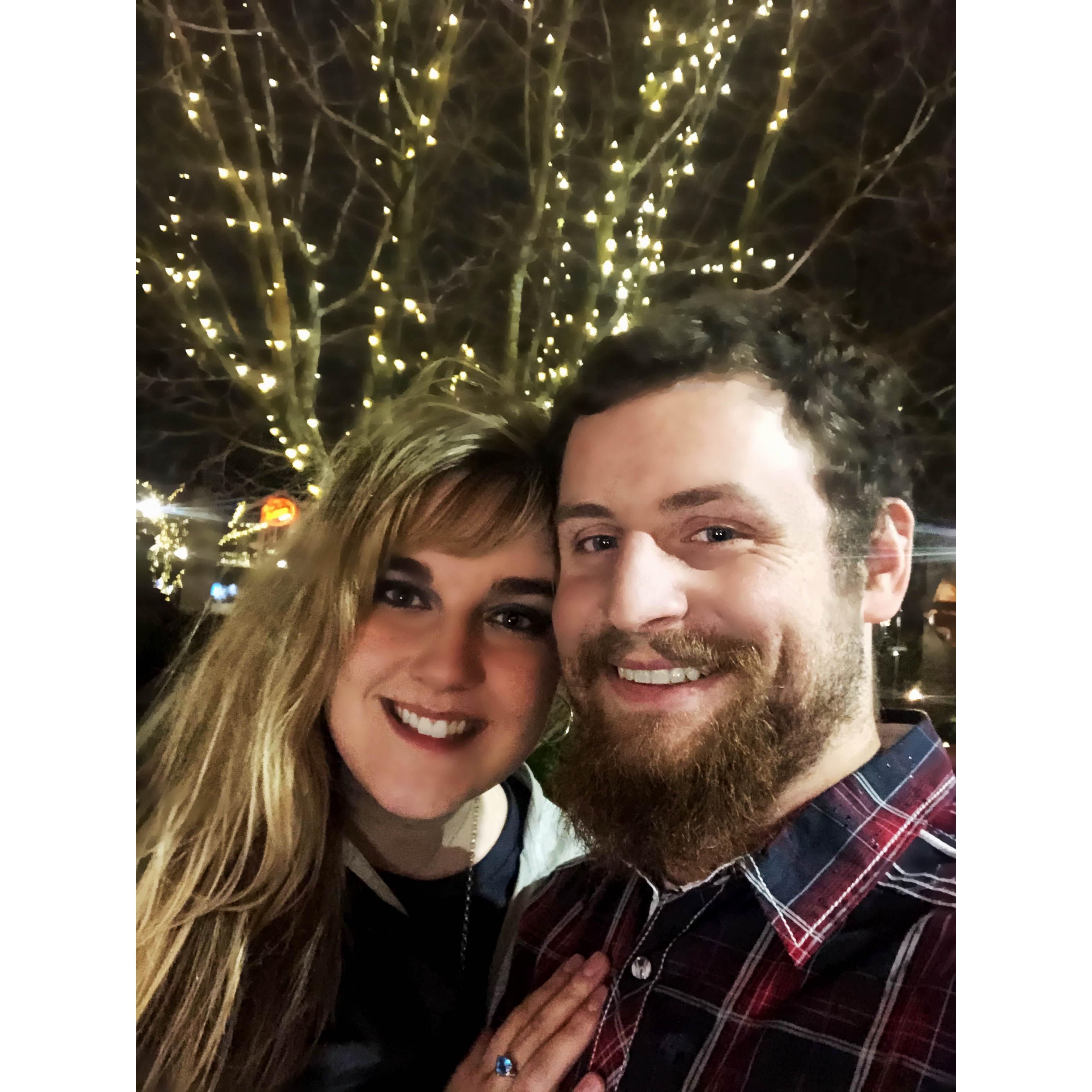 Date night during the Christmas season involves finding the nearest lit up tree and posing