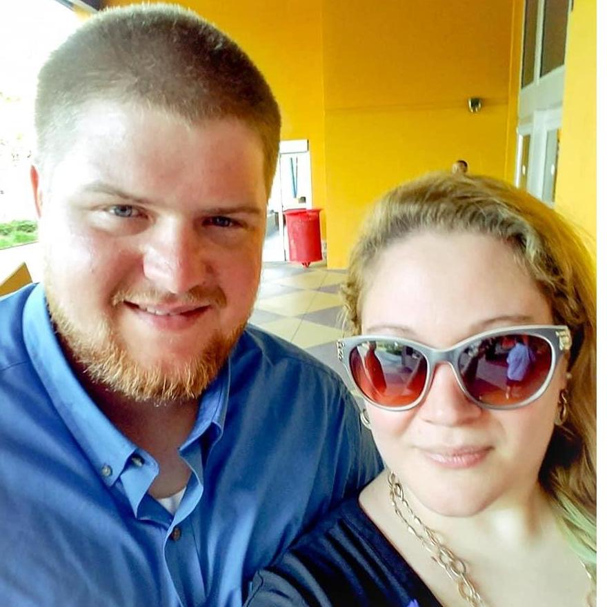 Playing putt-putt when Zach visited in May 2018.