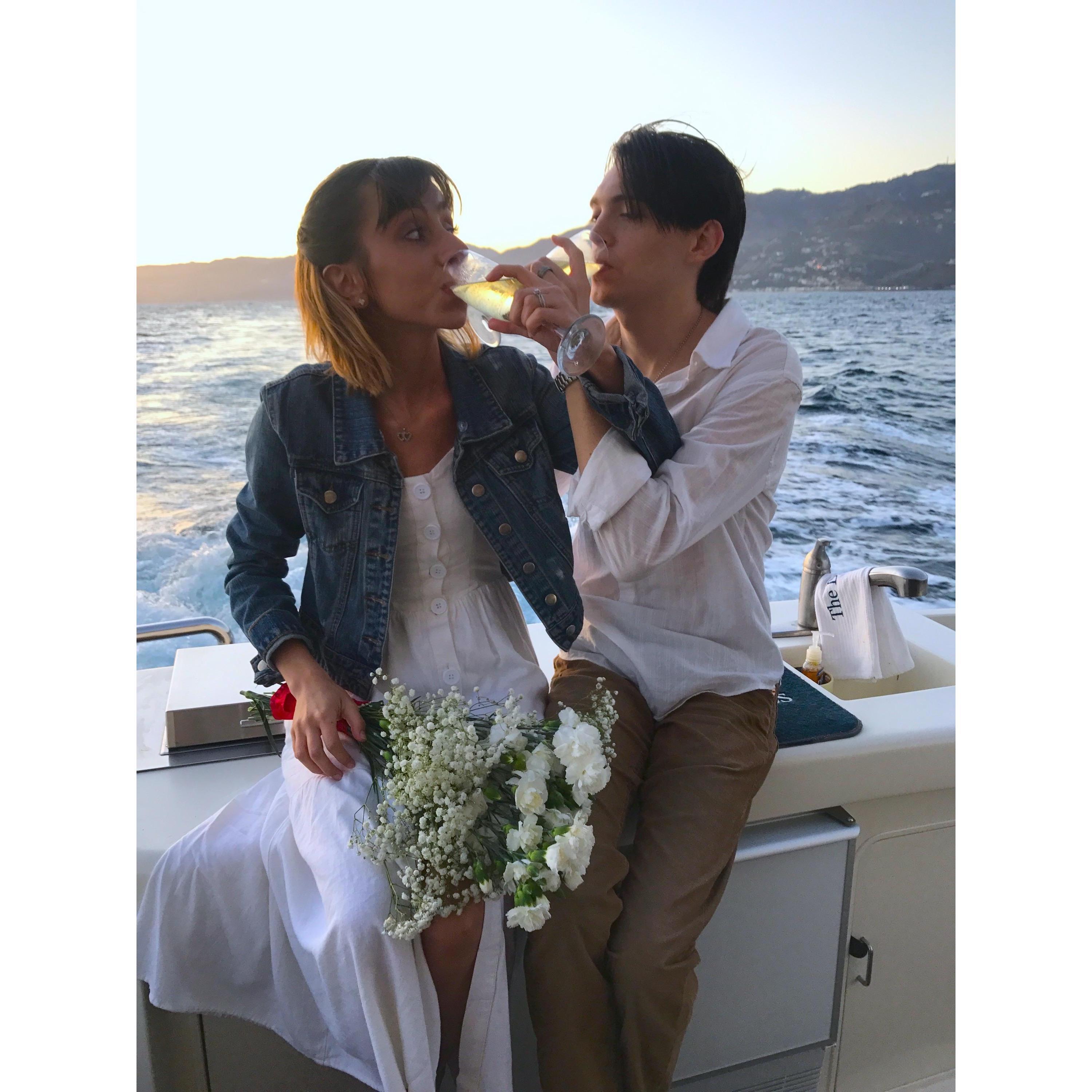 Celebrating the start of their new life together with champagne aboard The Duchess in Malibu, California!