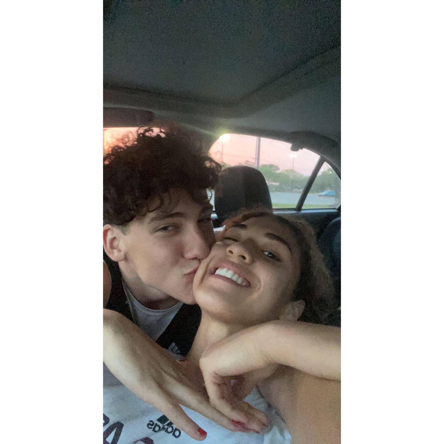 Our first few dates as juniors in high school consisted of sitting in the Randall's parking lot and talking. We would prop a phone up on the radio dials to watch movies while drinking sonic slushes.