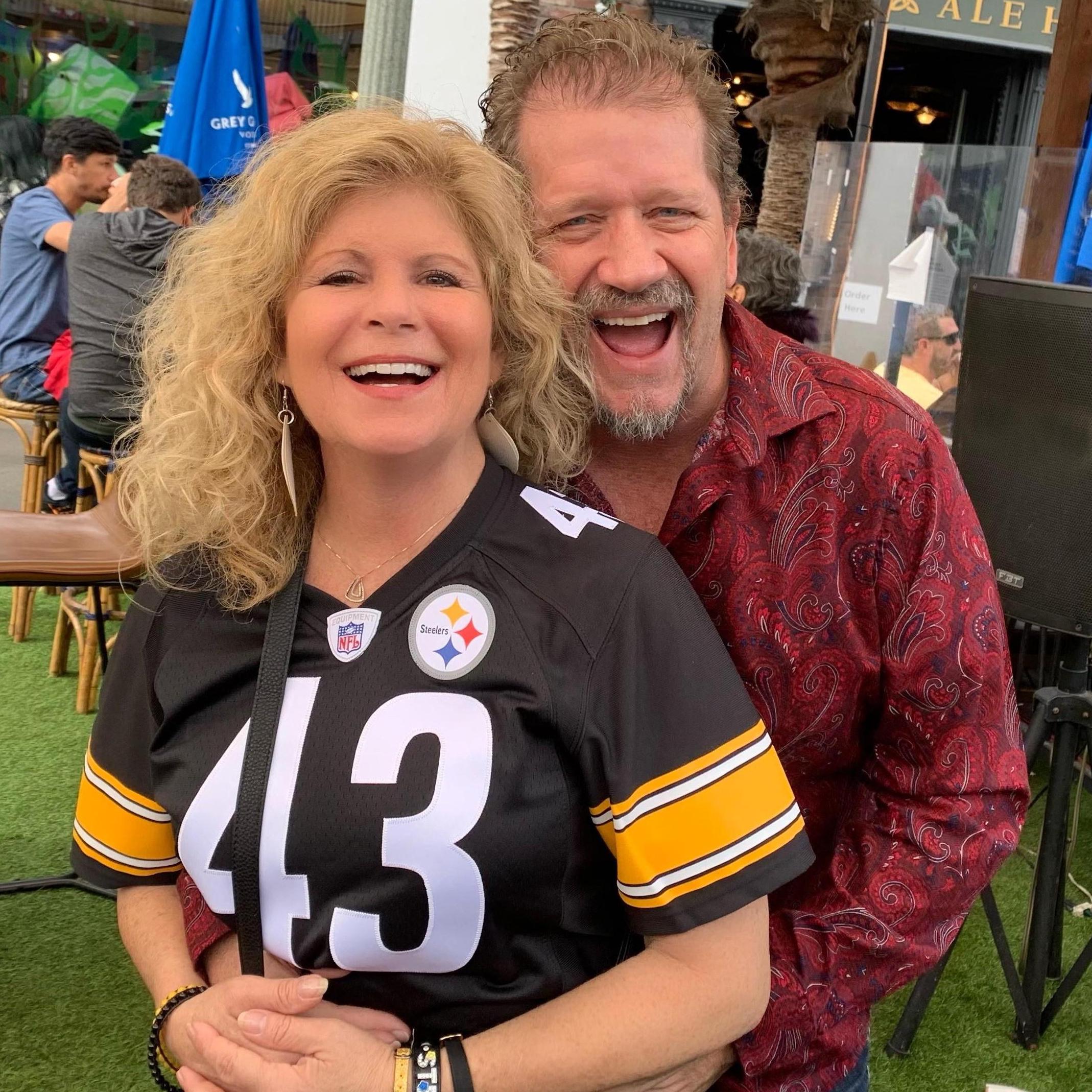 House divided, hearts united in football. Pittsburgh and San Fran in downtown Huntington Beach.