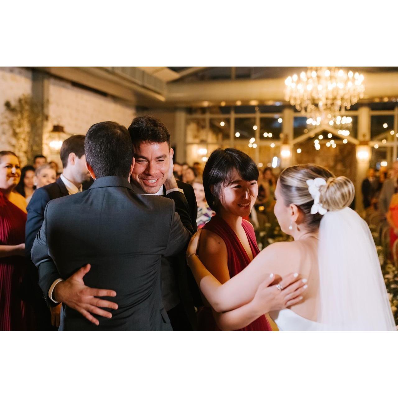 The moment we were the best man and bridesmaid, filled with pride and joy—and knowing we’d be the next to say 'I do.'