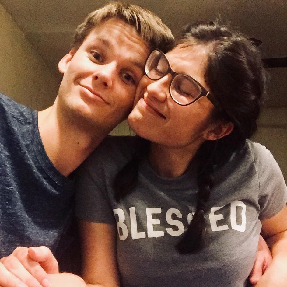 Early August 2018: Such a sweet photo... What you can't tell is that Con was trying to tickle the daylights out of me so I was holding his hands back. :-)