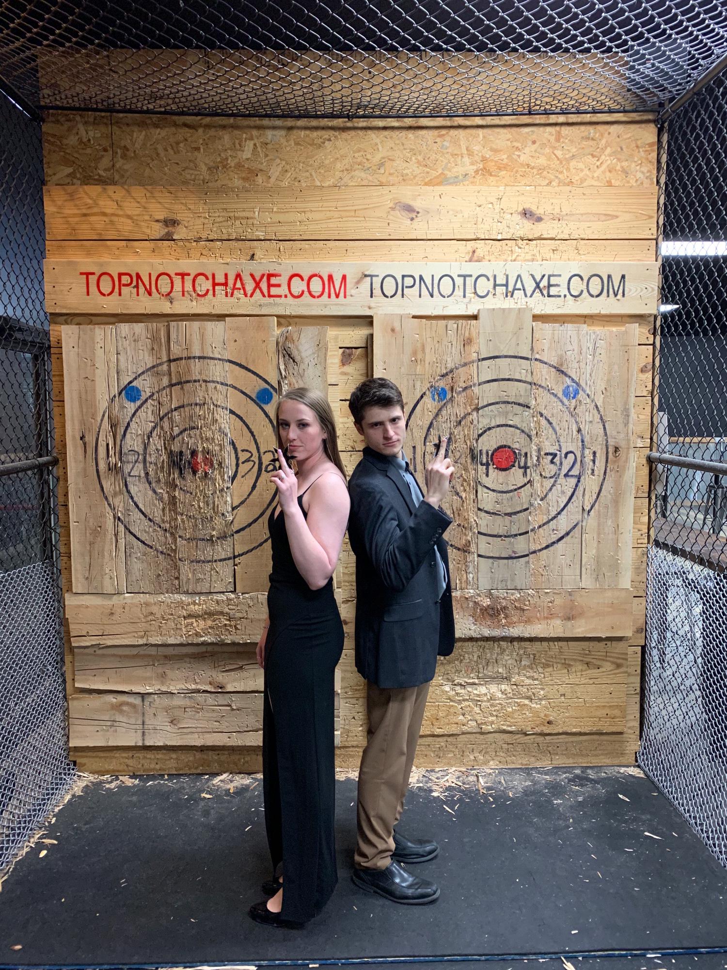 What better way to end the night of our engagement than with some axe throwing! Bonus points for the cool outfits..right?