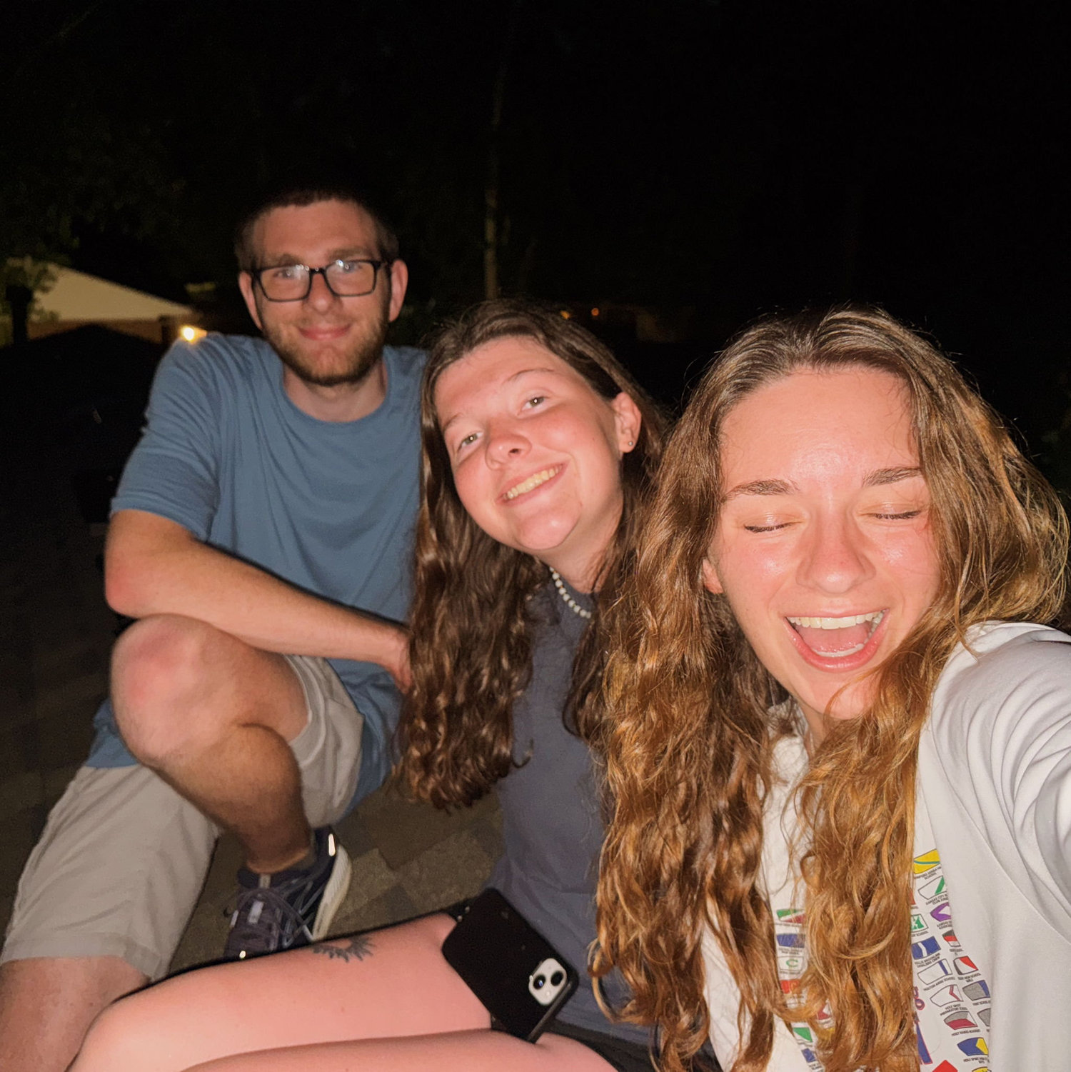 Daniel, Hannah, and Ashley on the roof to watch fireworks