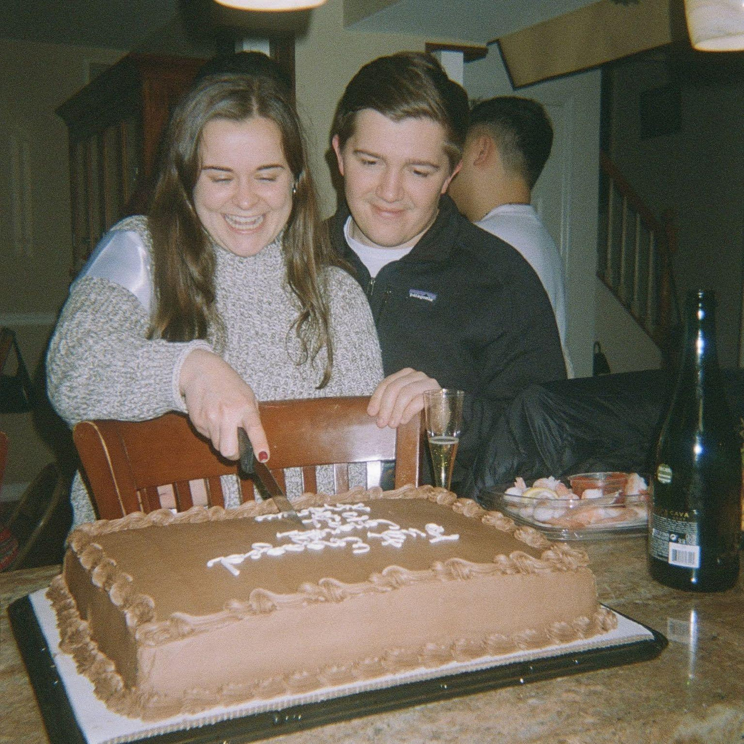 Cutting the cake at our engagement party!