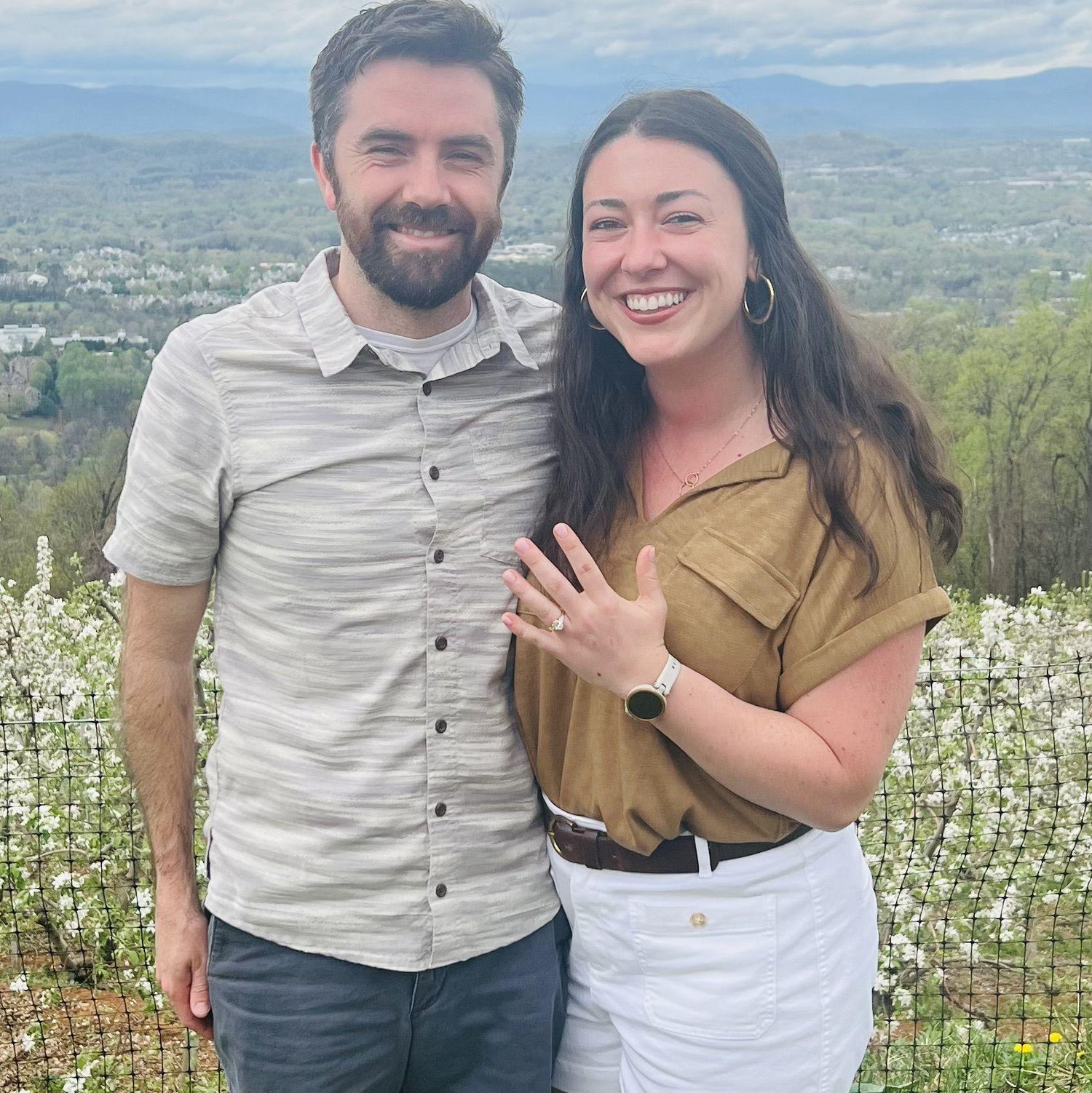 Connor proposed while we were on a walk at Monticello, then we went up to Carter's Mountain and asked a lovely stranger to take this picture of us!