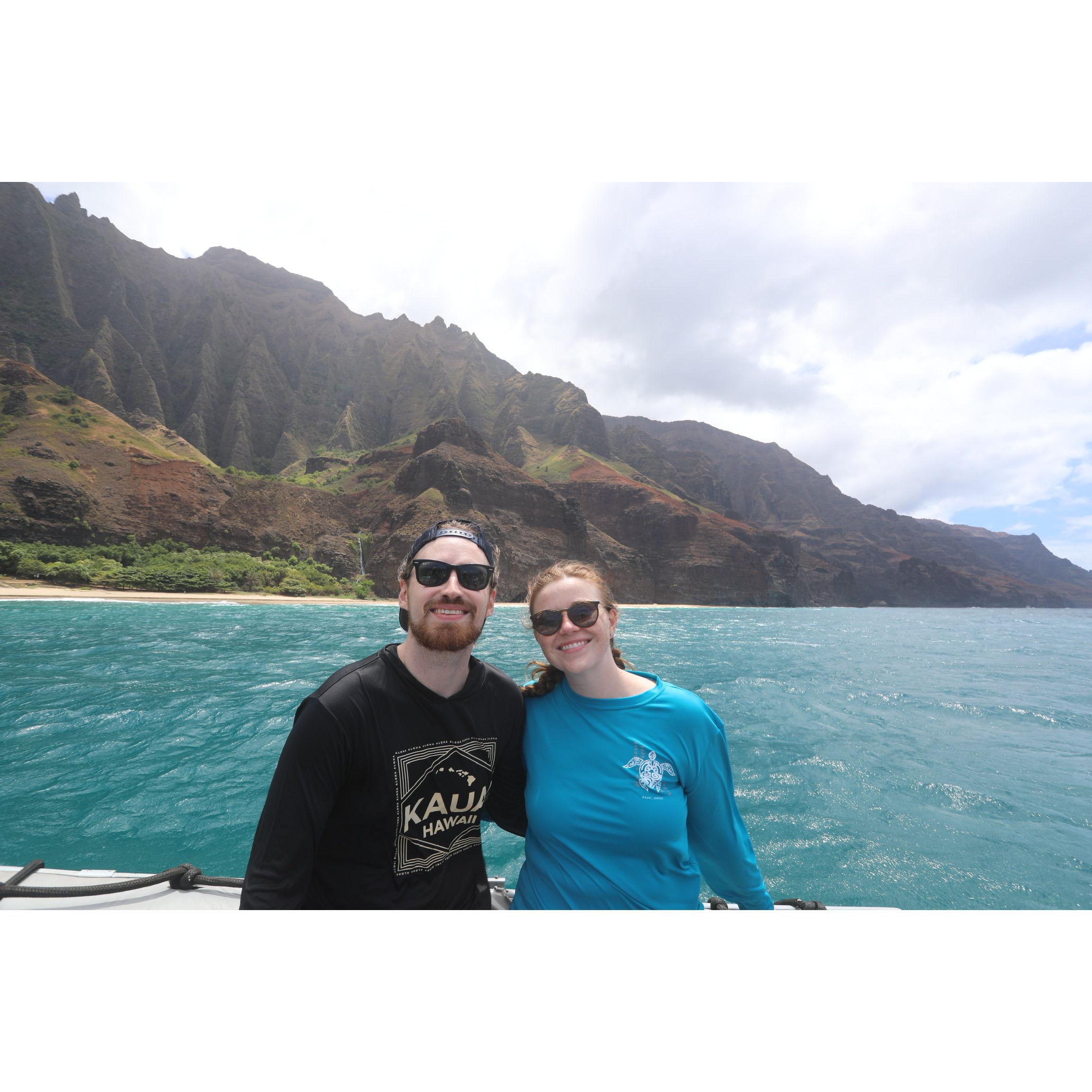 In front of the beautiful Nā Pali Coast in Kauai, Hawaii. We had a blast riding the big waves on this adventure boat tour - highly recommend!