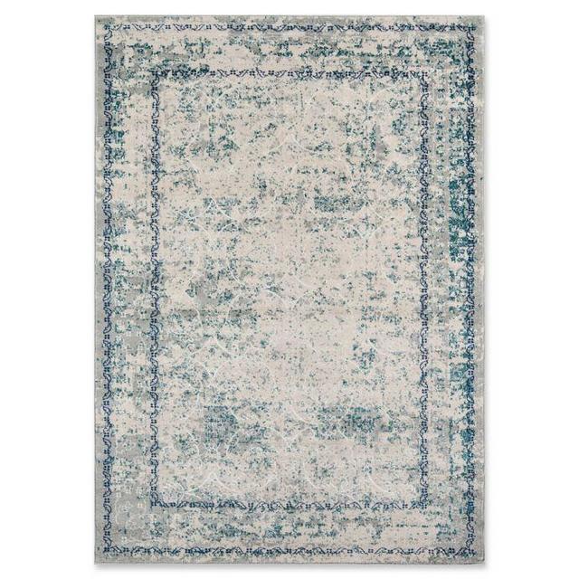 Momeni Luxe Distressed Border 5’3 x 7’6 Area Rug in Blue
