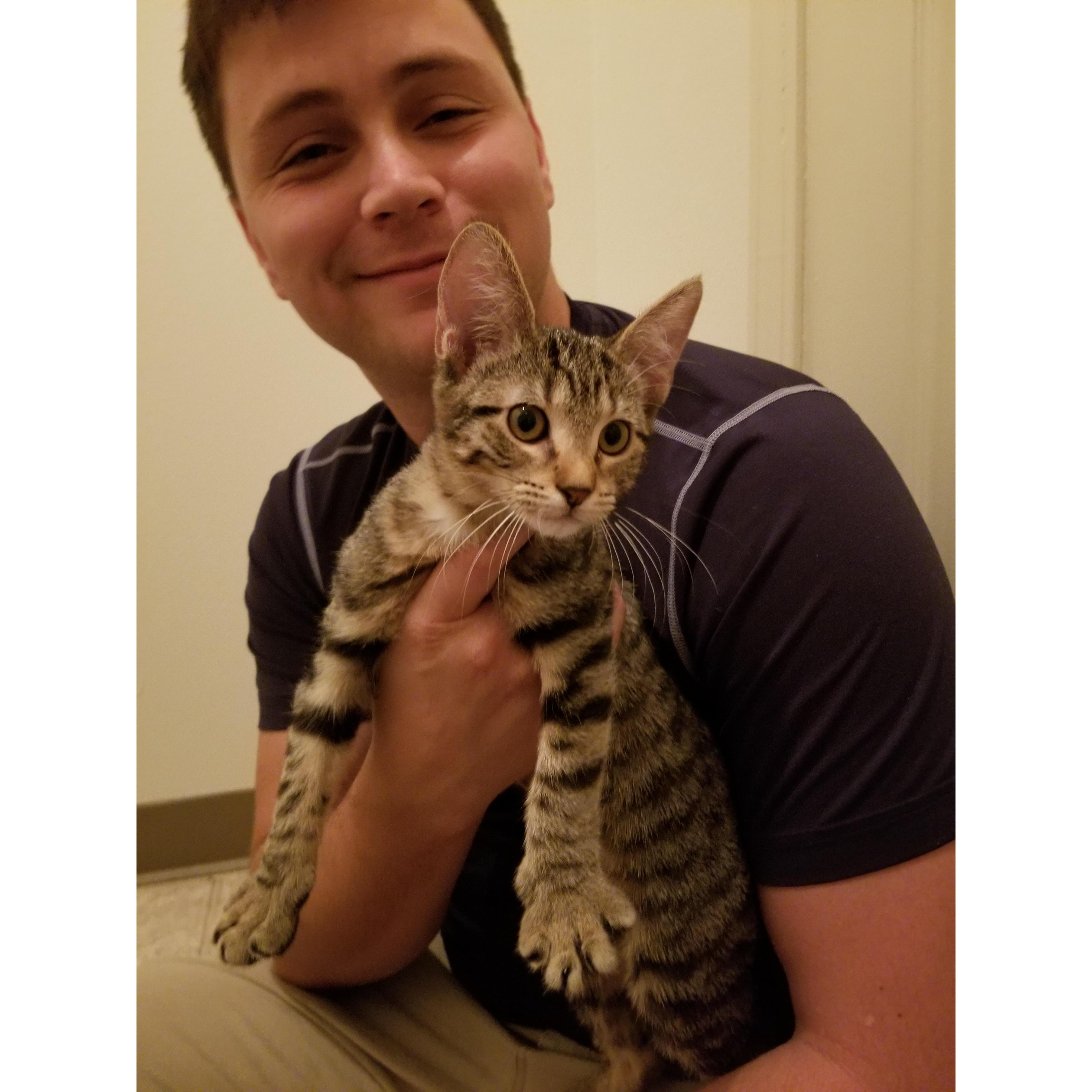 Chris meeting Kiwi for the first time the day I brought her home