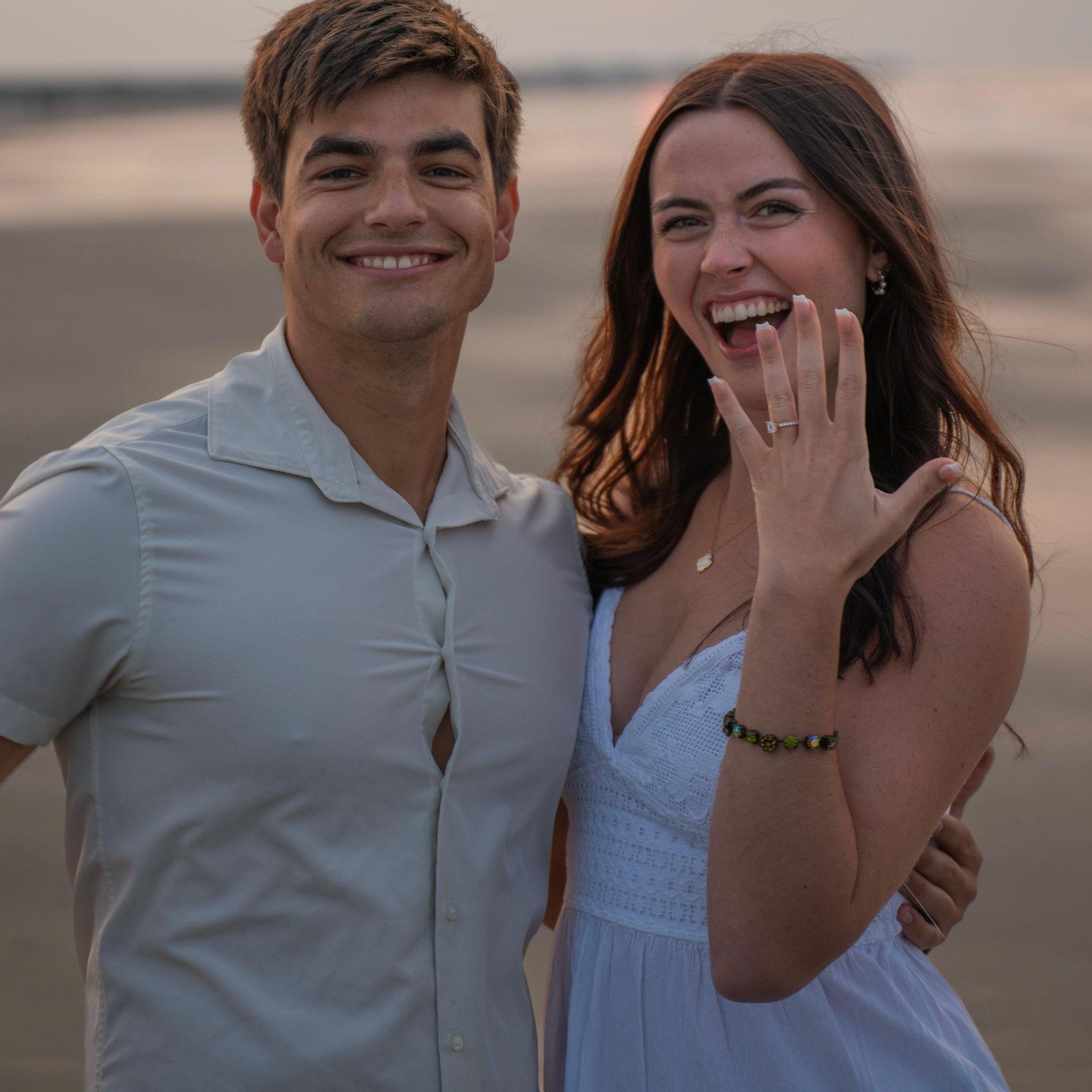 Nathan proposed to Amanda on a 6:30 AM beach walk at the Isle of Palms!