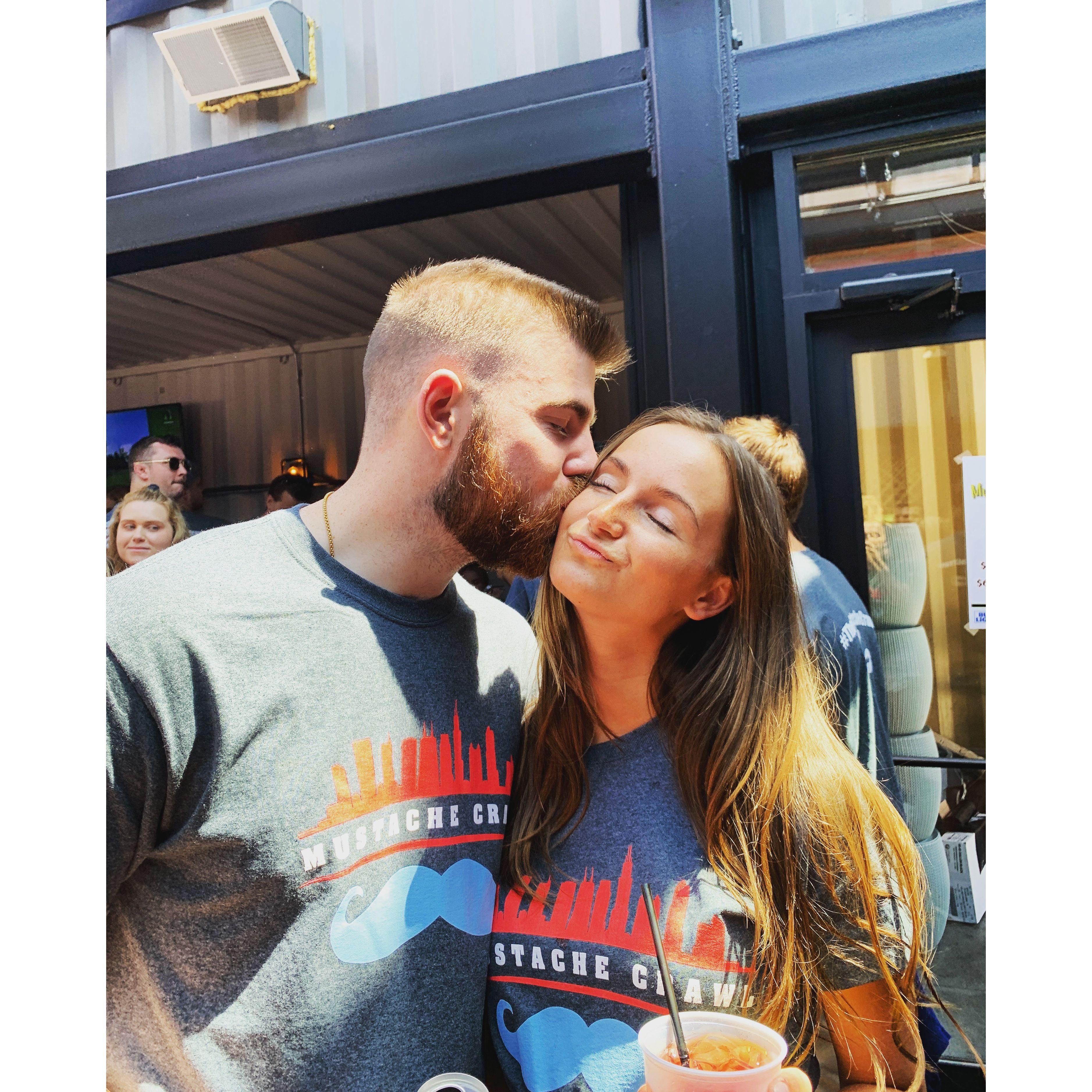 Having fun at the Mustache Bar Crawl after moving to Chicago post-college