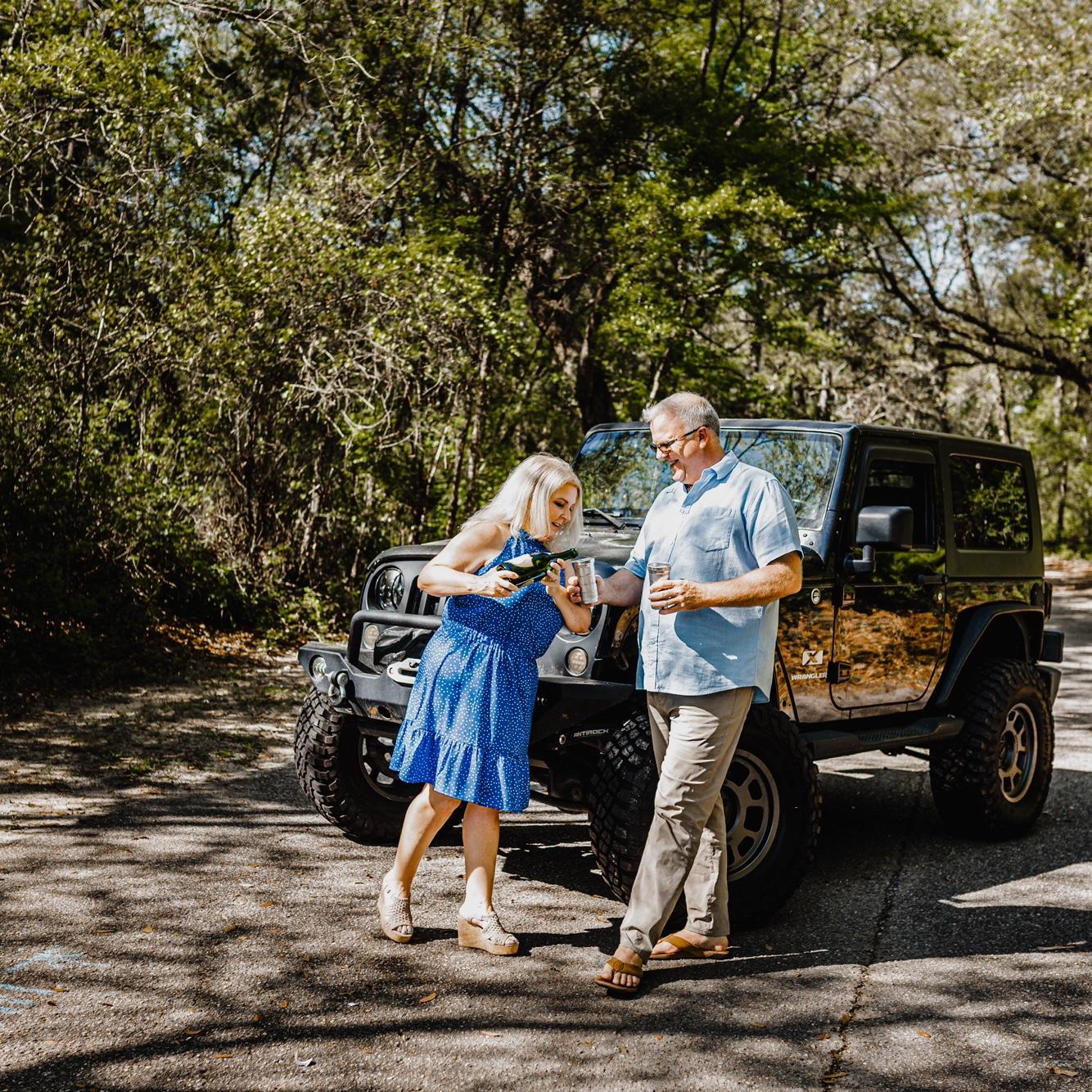 Having champagne, our Jeep, and our home