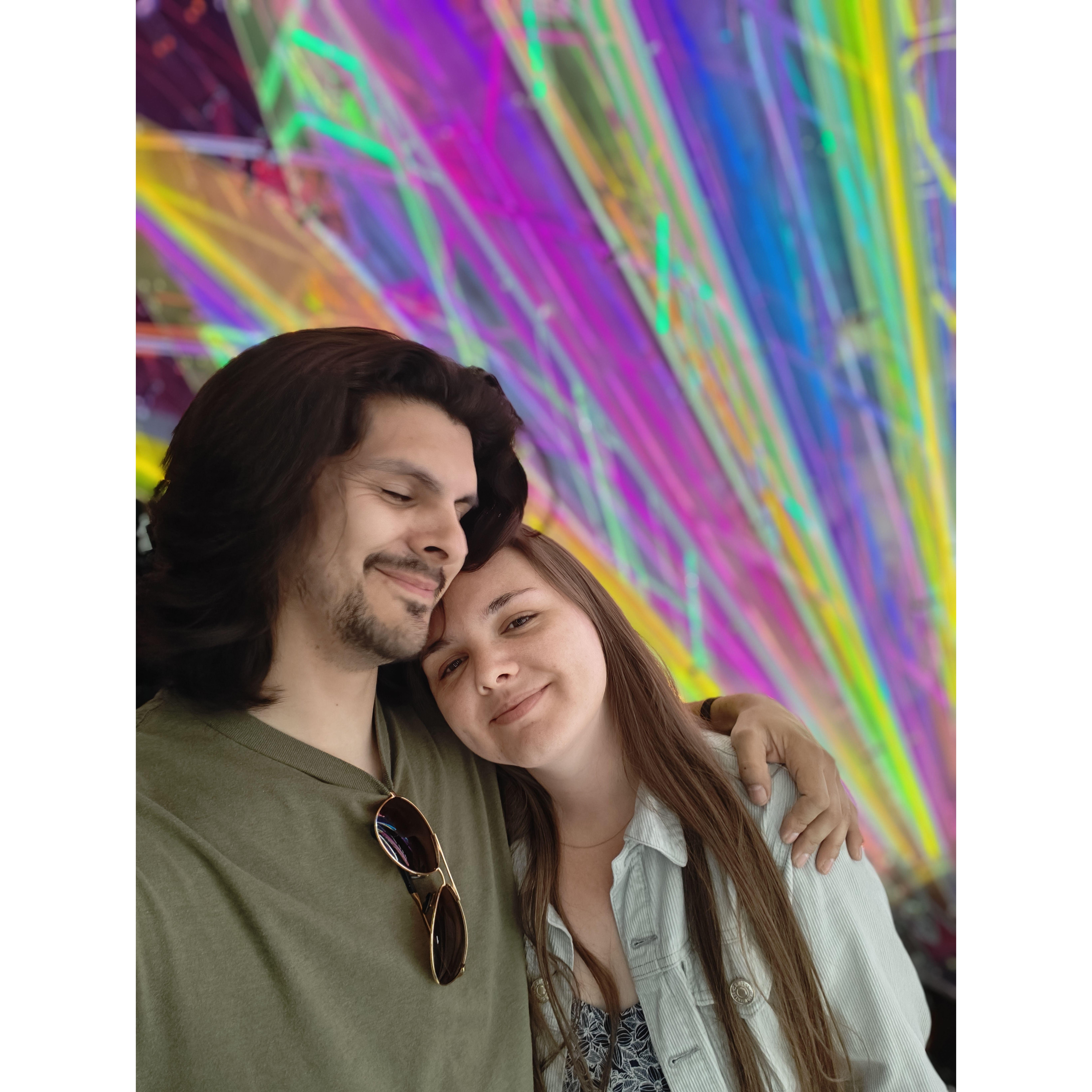 Malina and Nathaniel on one of their many trips to Vegas. This picture was snapped during their last Vegas trip in 2024 while in front of their favorite place in the city: Area 15.