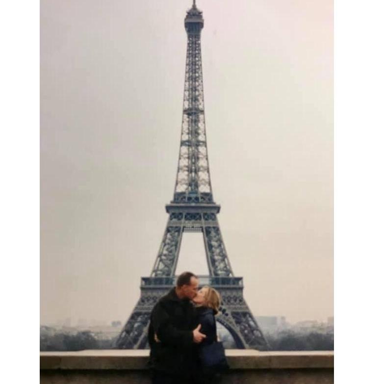 Todd & Paulette Poynter (Father and Mother of the Bride) Sharing a most romantic kiss in front of the Eiffel Tower 2002.
