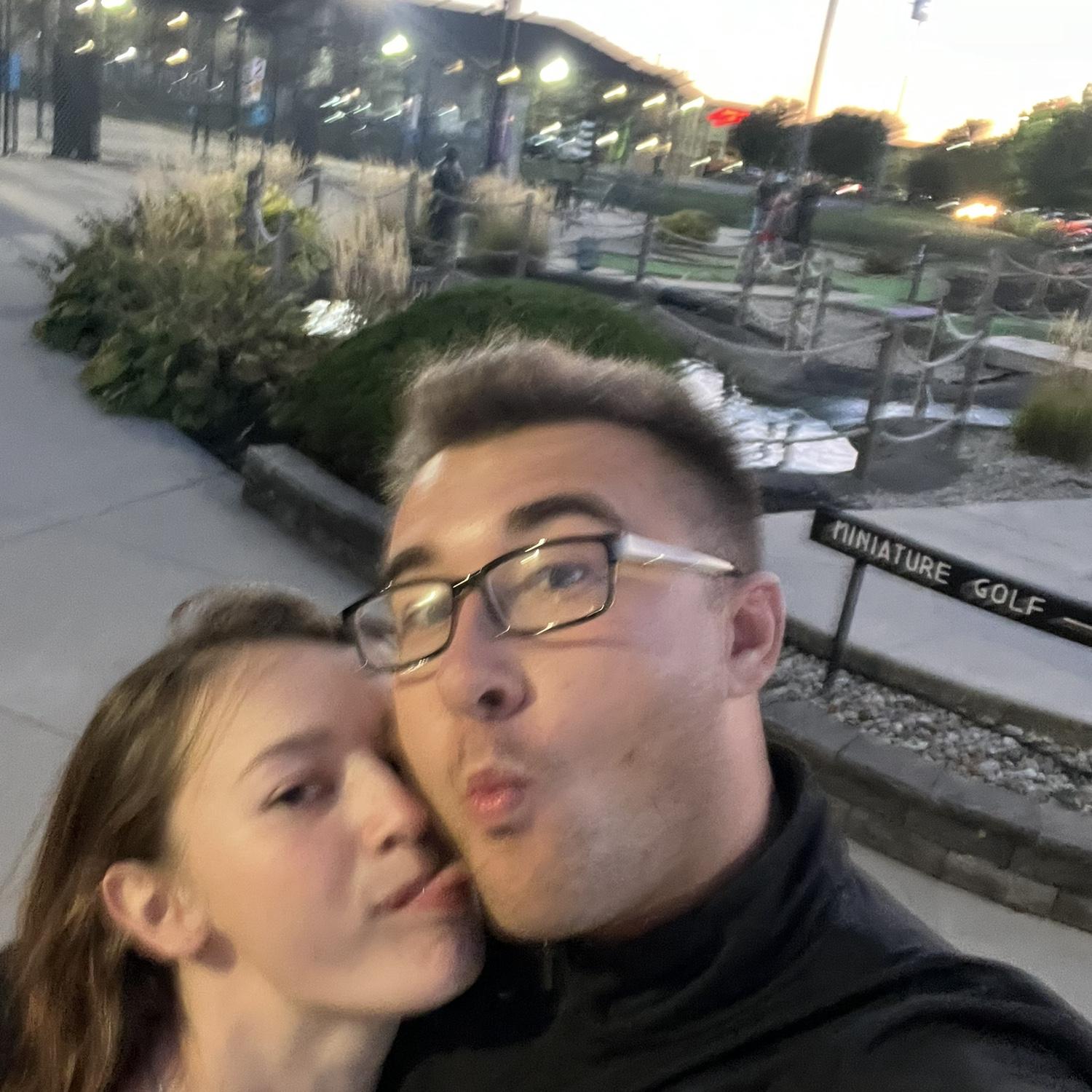 The bride and grooms first official date in August 2024! They went mini golfing.