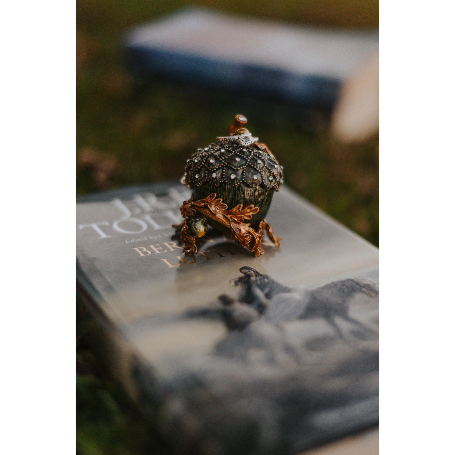 Vic's Engagement Gift for Emily atop the book "Beren and Luthien", the most romantic love story in J.R.R.'s Tolkien's Middle Earth stories. Photo Credit: Lindsey Angus of HeartSpeaksVisuals