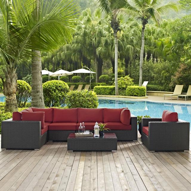 Tripp 6 Piece Rattan Sunbrella Sectional Seating Group with Cushions