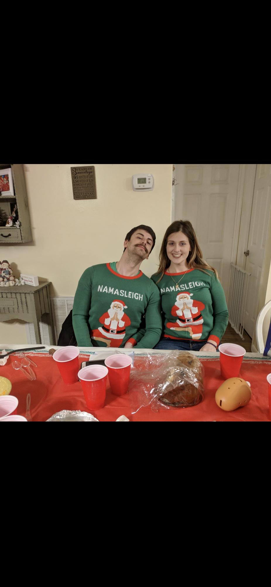Matching ugly Christmas sweaters to celebrate another year!