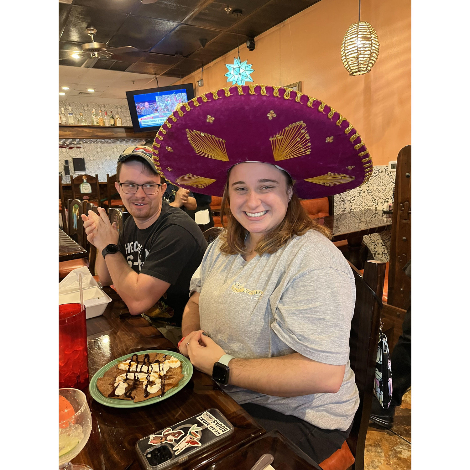 Celebrating my 26th birthday at Sam Marcos Tacos with my parents in North Florida.