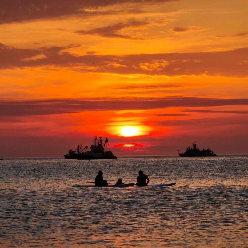 Get a Paddleboard or kayak to enjoy the sunset in a different way