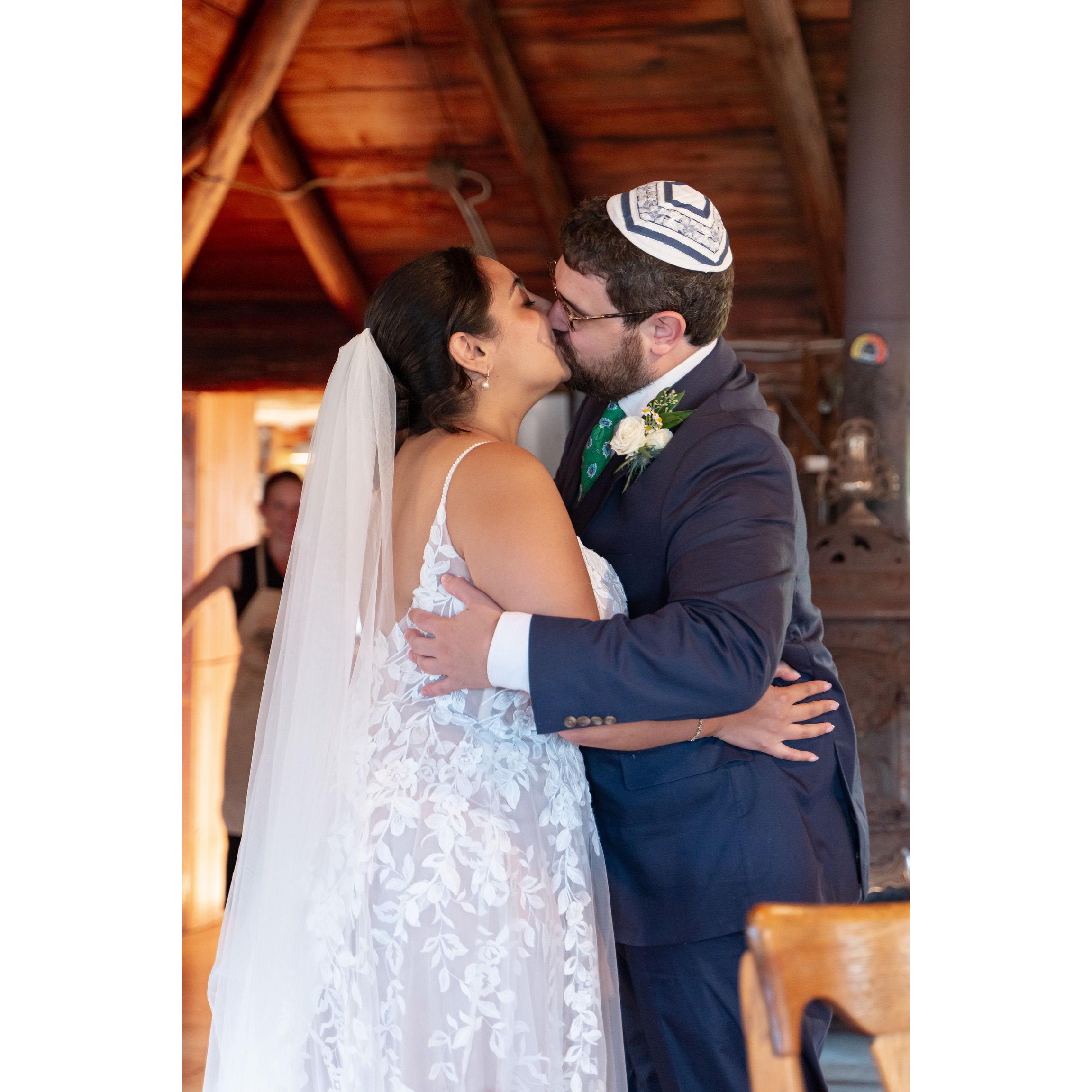 Stealing a kiss before the ceremony