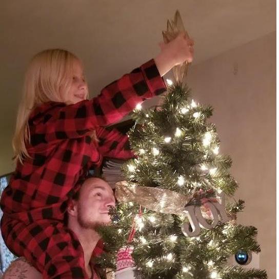 Back when Cayla actually needed a boost to add the final touch to the Christmas tree.